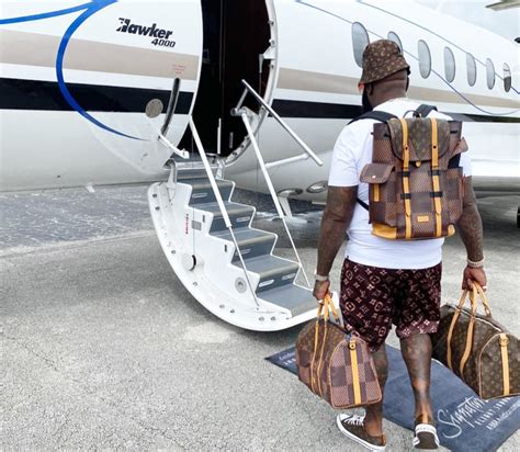 rick ross fake louis bag|rick ross net worth $100 million.